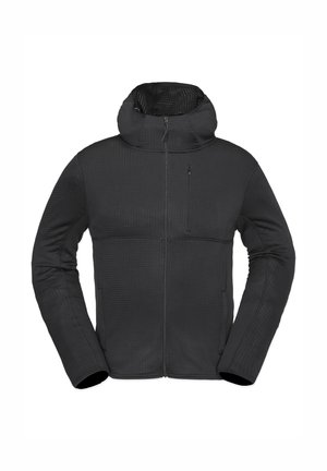 Chaqueta aislante negra con un patrón texturizado, cuello alto, cierre frontal de cremallera y un pequeño bolsillo con cremallera en el pecho. Material suave.