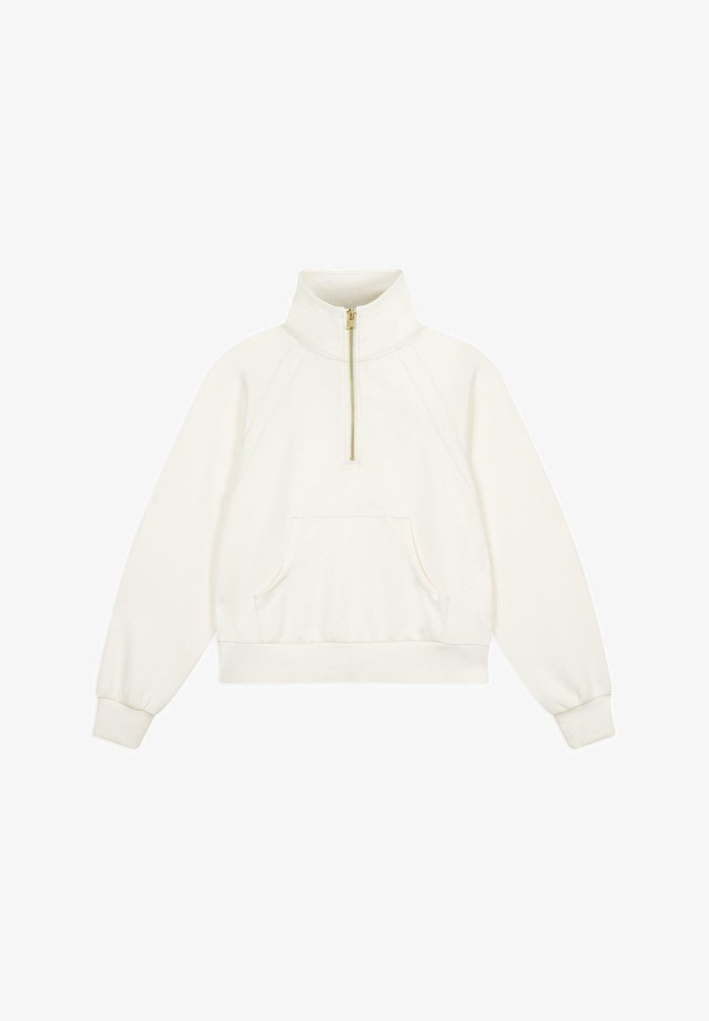 Fleece mikina v barvě slonové kosti s polo zipem na krku, raglánovými rukávy, přední klokaní kapsou a žebrovanými manžetami na spodním lemu a rukávech.