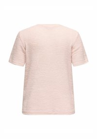 Trumpas rankovėmis, apvalios kaklo marškinėliai iš minkštos šviesiai rožinės tekstūruotos medžiagos. Paprastas dizainas be raštų ar matomų akcentų. Švarus, apvalus apdailos kraštas.