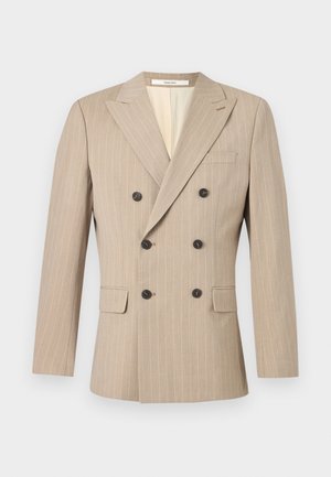 Beige dubbelgeknoopte blazer met krijtstreep, pieklappaleis, zwarte knopen, twee klepzakken aan de voorkant en een borstzak met bies.