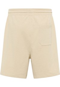 Beige cotton shorts with an elastic waistband, featuring a back pocket and a smooth texture. Ends at mid-thigh with a simple design.