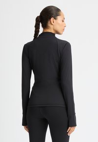 Röhnisch LEGACY FULL ZIP - Chaqueta de entrenamiento - black