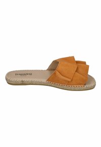 Orange suede slide sandal featuring a triple-layered bow design on the upper, with a textured espadrille sole and a flat footbed.