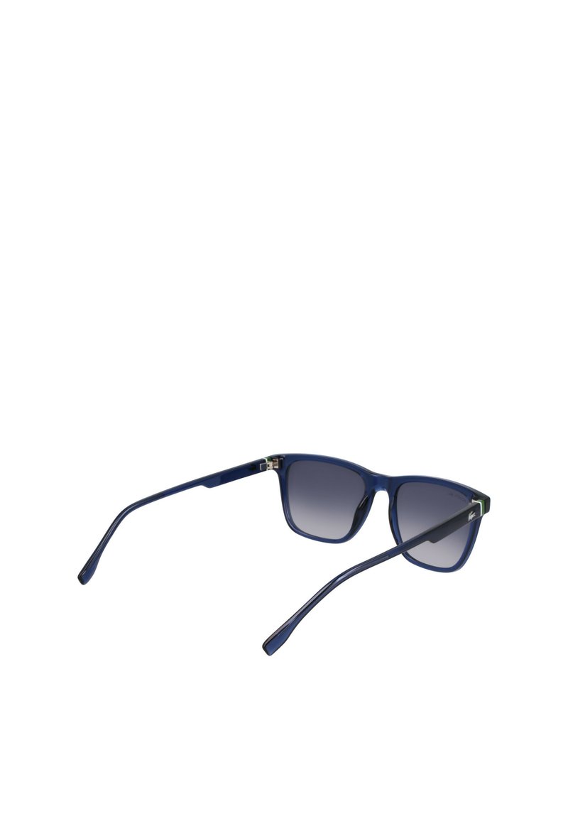 Blue plastic sunglasses with gradient lenses, square shape, slim arms, and a small branded accent near the hinge.
