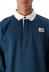 The North Face HERITAGE RUGBY - Sweatshirt - midnight petrol