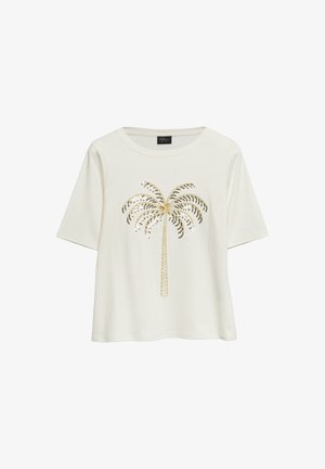 Chemise blanche à manches courtes avec un col rond, ornée d’un motif de palmier en sequins dorés et noirs sur le devant.