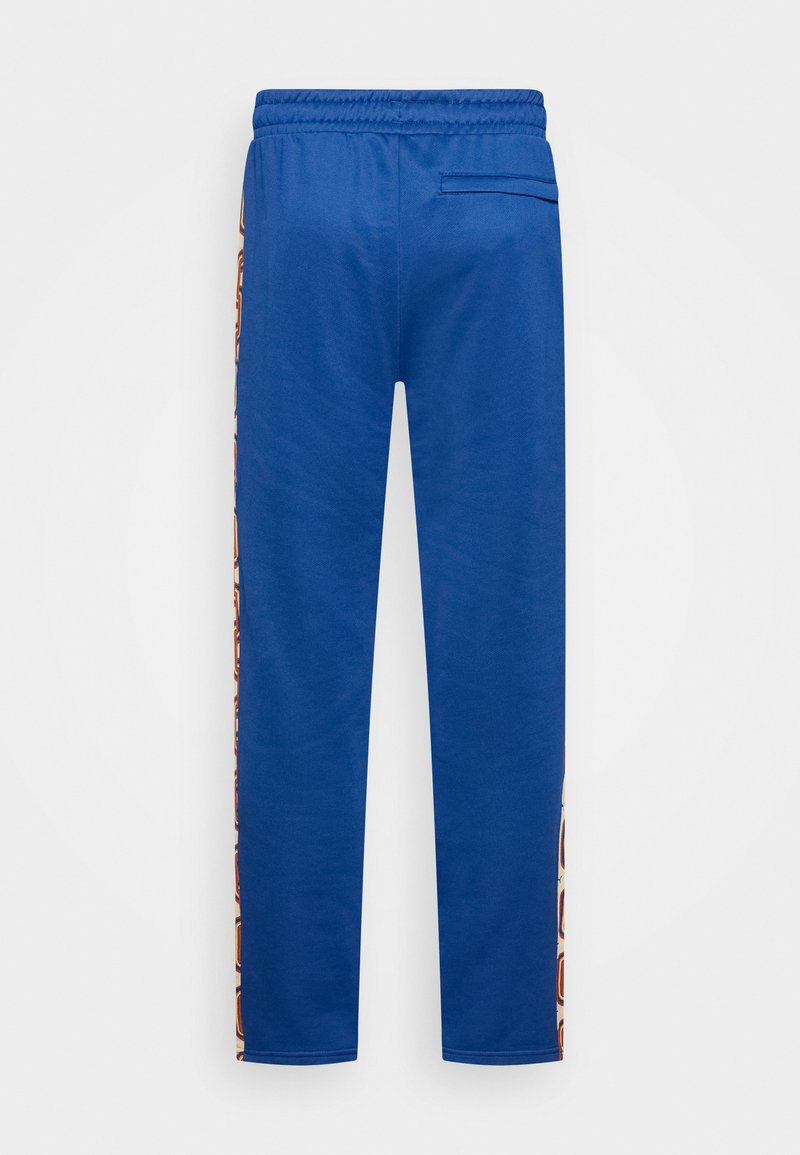 Puma PSCHEDELIC TRACK PANTS - Teplákové kalhoty - blazing blue