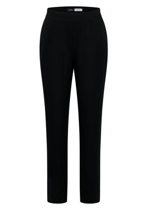 Pantalon noir ajusté avec une ceinture élastique et des poches latérales, étiqueté « Cecil Pants ».