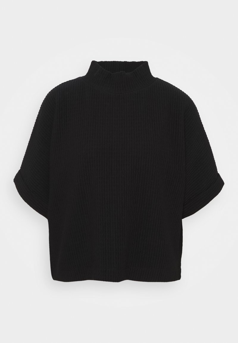 Svart kortärmad topp med hög, ribbad turtleneck-design. Har en avslappnad passform och textilstruktur. Inga synliga mönster eller accenter.