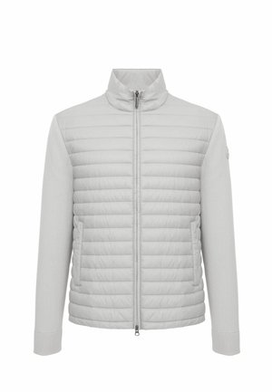 Šviesiai pilka dygsniuota striukė su pilnai užsegamu priekiu, stovimu apykakliu ir šoninėmis kišenėmis, su ribinėmis rankogaliais ir lygiomis rankovėmis.