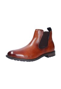 Botín Chelsea de cuero marrón con paneles laterales elásticos, puntera redondeada y suela de goma negra texturizada. Cuenta con una lengüeta para facilitar su colocación.