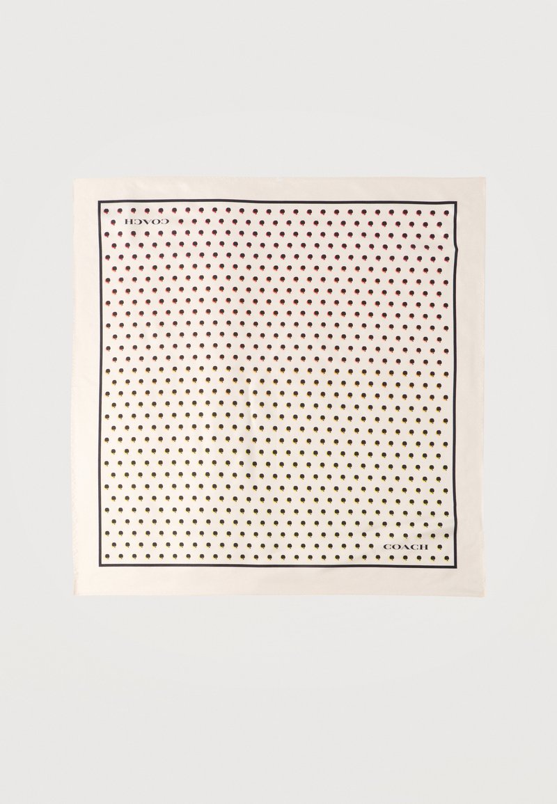 Κρεμ τετράγωνο μαντήλι με μικρές μαύρες και καφέ βούλες, λεπτό μαύρο περίγραμμα και λογότυπο "COACH" σε δύο γωνίες.