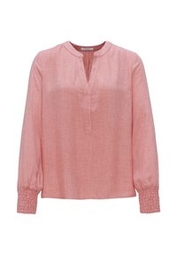 Blouse rose à manches longues avec col montant et encolure à patte. Dotée de poignets froncés et d'un tissu texturé.
