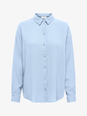 Lyseblå langærmet skjorte med knapper, lavet af tekstureret stof og med spids krave.