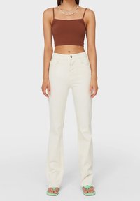 Stradivarius Flared Jeans - mottled beige