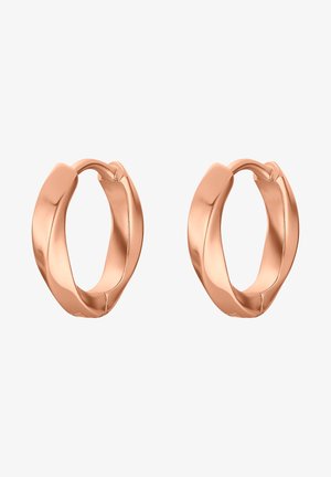 Orecchini a cerchio in oro rosa con design attorcigliato, caratterizzati da una finitura liscia e lucida e da una forma leggera e aperta. Gli accenti evidenziano la curvatura.