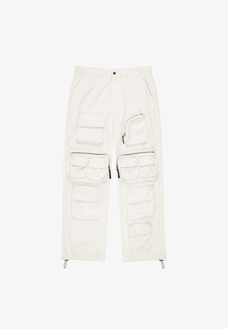 White cargo pants made of fabric featuring multiple large pockets, a zippered pocket, and adjustable ankle drawstrings.