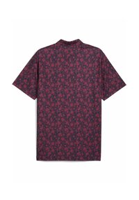Kortærmet skjorte i mørk navy med blomsterprint i nuancer af rød og pink. Har krave og en afslappet pasform.