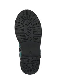 Zwarte rubberen buitenzool met gestructureerde profiel en tractiepatroon. Bevat gegolfde contouren en kruisvormige accenten. Maatindicatie 24.