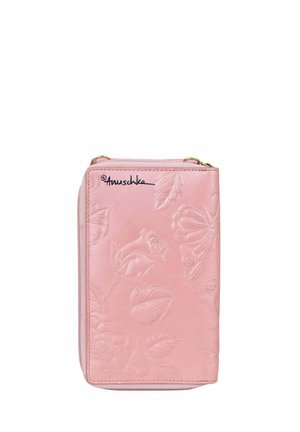 Pink leather wallet with embossed floral and butterfly designs, featuring a zip closure and signature in black. Smooth texture, rectangular shape.