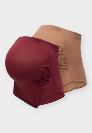 Dos pares de pantalones cortos premamá, uno de color burdeos y otro tostado, con paneles elásticos diseñados para cubrir la barriga de embarazada.