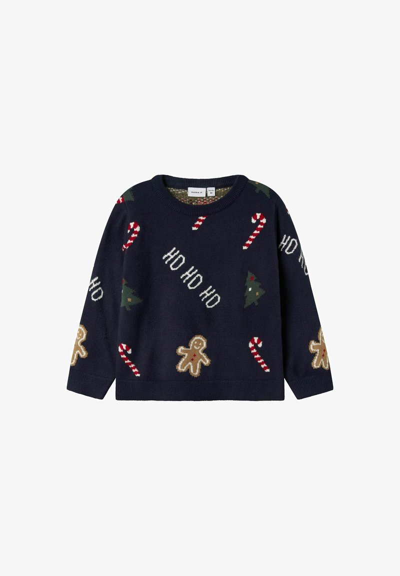 Marinblå stickad tröja med julmotiv: pepparkaksgubbar, godistänger och julgranar i grönt och rött. Rundad halsringning och långa ärmar.