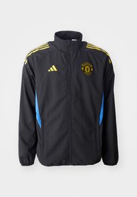 MANCHESTER UNITED 25/26 EUROPEAN PRESENTATION JACKET - Club wear - black/hi-res blue/tribe yellow