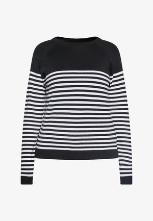 Csíkos pulóver, amelynek fekete a felső része és váltakozó fekete és fehér vízszintes csíkokkal rendelkezik. Puha, kötött anyagból készült.