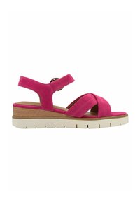 Sandal in suede rosa con cinturini incrociati e cinturino alla caviglia regolabile, caratterizzato da un tacco a blocco in legno, suola in gomma e plantare testurizzato.