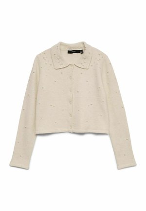 Kremowy krótki kardigan z kołnierzykiem, zapinany na guziki z ozdobnymi małymi koralikami rozmieszczonymi na całej tkaninie.