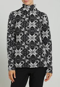 Schwarzer und weißer, gemusterter Fleece-Pullover mit halbem Reißverschluss, ausgestattet mit geometrischen Schneeflockenmuster und einem hohen Kragen.