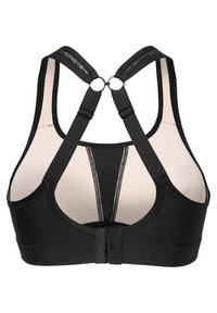 Svart sportbehå med justerbara remmar, andningsbart tyg och en hakebakförslutning. Har en kontrasterande sömdetalj på framsidan.