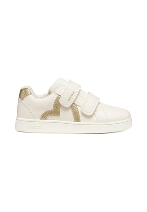 Sneaker bianca con due strap in velcro, motivo a cuore dorato con glitter sul lato, e suola bianca, vista laterale.