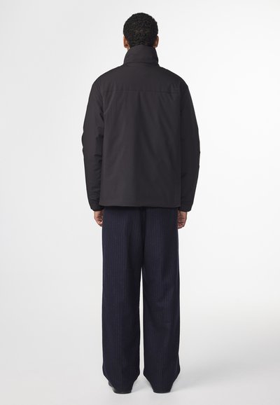NN.07 SKIPP - Jas - black