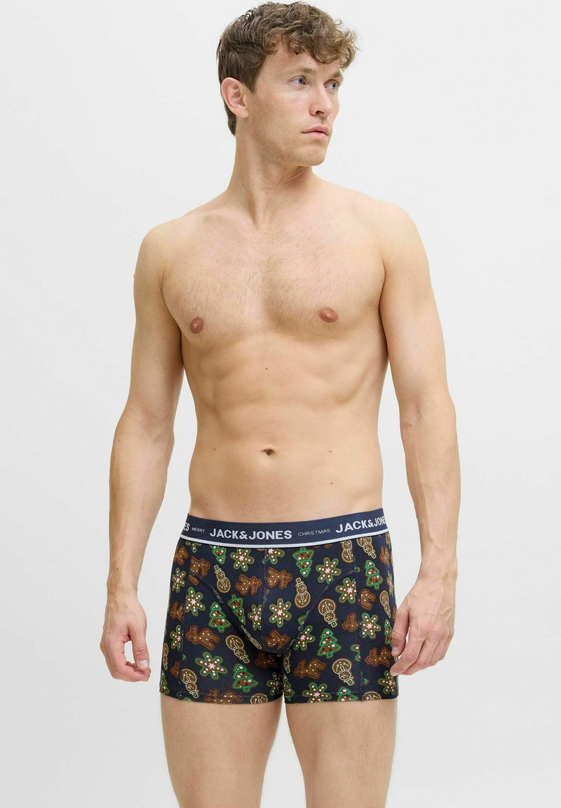 Zwarte boxershorts met een feestelijke gingerbread- en feestdagenontwerp. Zachte stof, elastische tailleband met "JACK & JONES" merk in het wit.