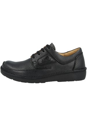 Black leather shoe with a textured surface, rounded toe, and low rubber sole. Features six eyelet lace-up closure and subtle branding.