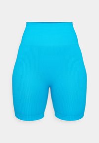 Ribbet høyt livet shorts i lys blå, med en tettsittende design og glatt tekstur. Kort lengde, med en behagelig elastisk midje.