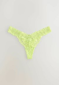 Lime green lace thong with floral pattern. Decorative scalloped edges and a sheer texture enhance its delicate appearance.