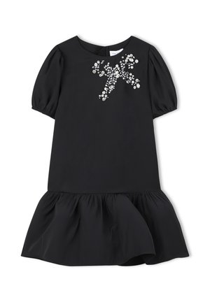 Black dress with short puff sleeves, a round neckline, and a flared ruffled hem. Decorated with sequined floral appliqué on the chest.
