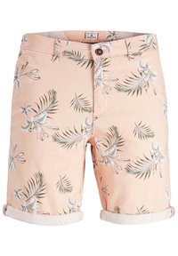 Shorts rose clair en coton avec un motif floral et de feuilles. Ils présentent des revers remontés et une fermeture à boutons sur le devant.