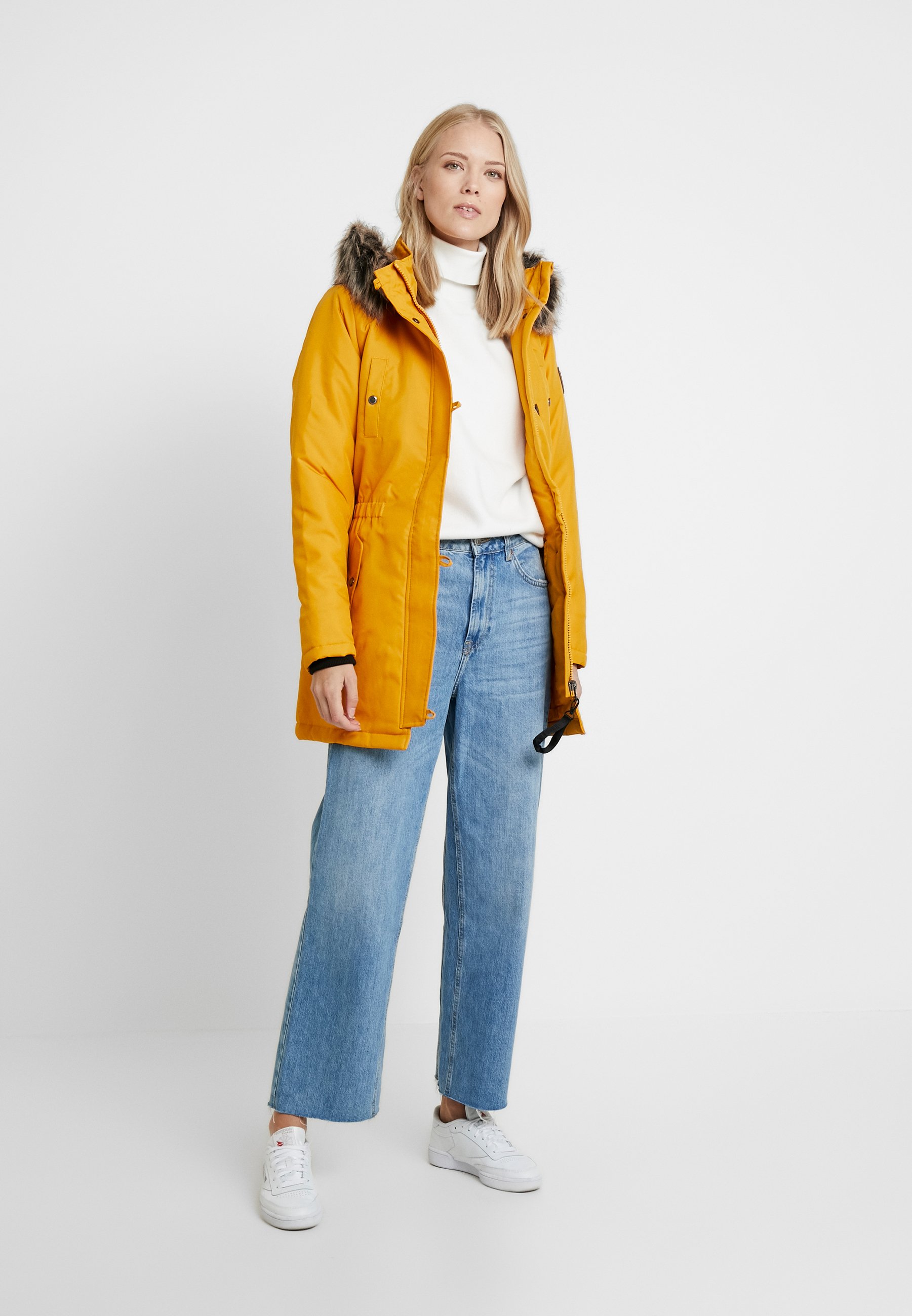 tall mustard coat