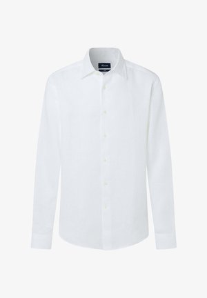 Chemise habillée blanche à manches longues avec boutons, col pointu et ourlet arrondi, présentée sur un fond blanc uni.