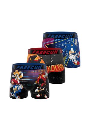 Trois paires de boxers avec les personnages et logos de Sonic the Hedgehog, avec des ceintures marquées "FREEGUN" de différentes couleurs.