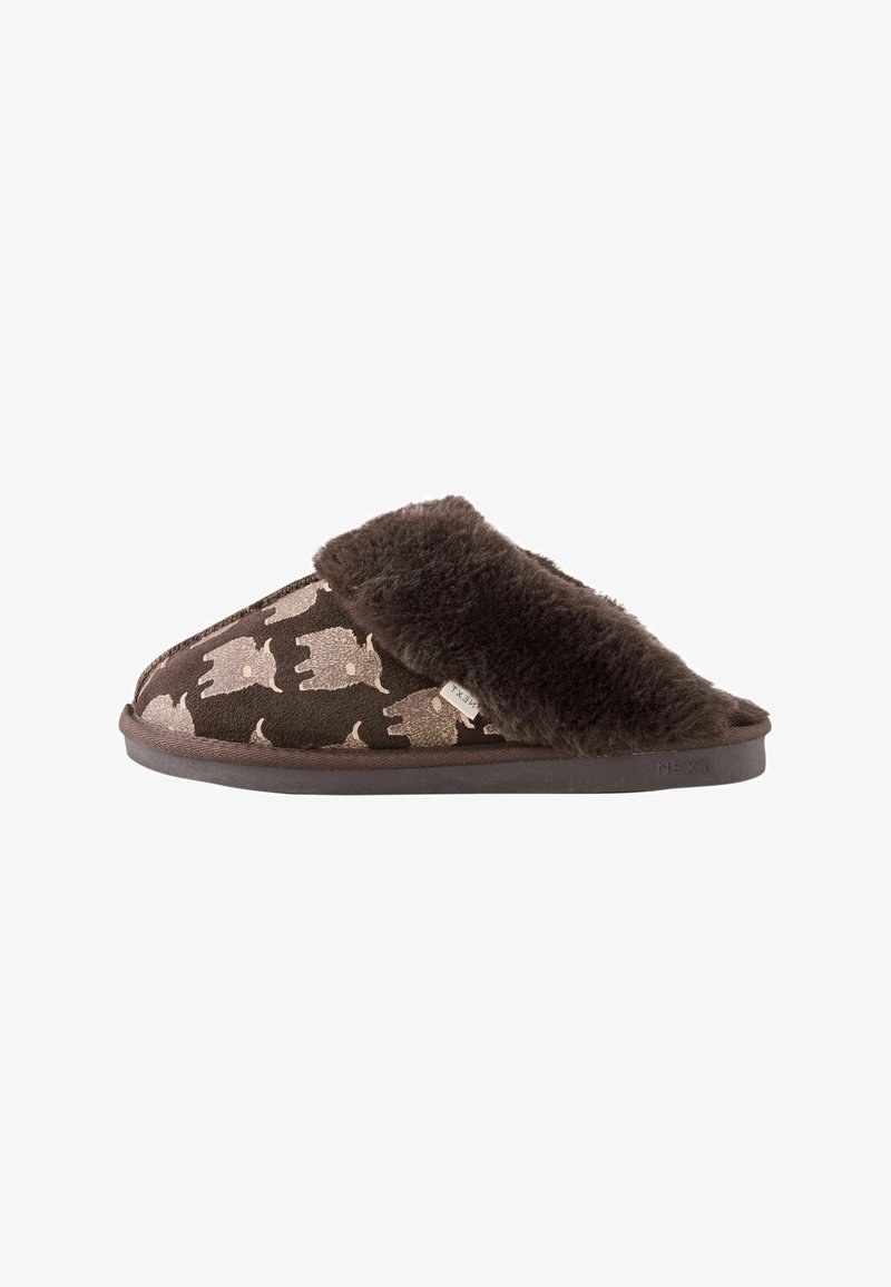 Brown slipper with plush lining and light brown sheep pattern on the outside, flat sole, and open back design.