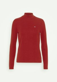 Rostrote langärmlige Ripp-Turtleneck mit kleinem rechteckigen Logo auf der linken Brust.