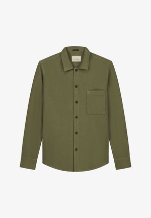 Alyvuogių žalios spalvos mygtukų marškiniai, pagaminti iš tekstūruotos medžiagos, su tiesiu apkakle, juodais mygtukais ir krūtinės kišene.