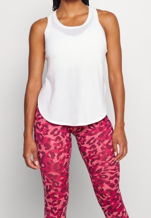 White tank top with a rounded hem, paired with pink leopard print leggings featuring a textured pattern. Simple design, lightweight material.