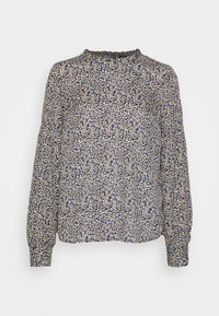 Blouse bleu marine à manches longues avec motif floral et feuilles beige et bleu clair, encolure froncée et poignets à boutons.