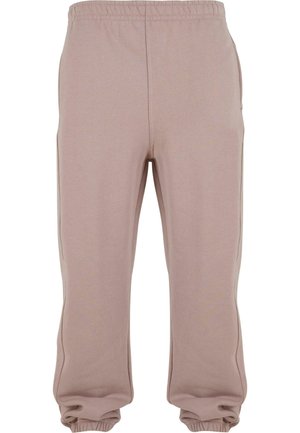 Lyse rosa joggebukser laget av myk stoff, med elastisk liv og mansjetter, samt sidelommer og en avslappet passform.