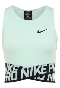 Crop top de sport Nike Dri-FIT bleu clair avec bande élastique noire et blanche "NIKE PRO" et logo swoosh noir sur la poitrine.